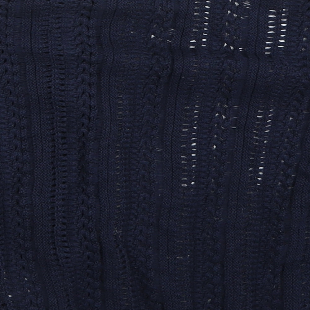 Brand and care label for Gap girls’ blue cardigan jumper, size 6-7, years