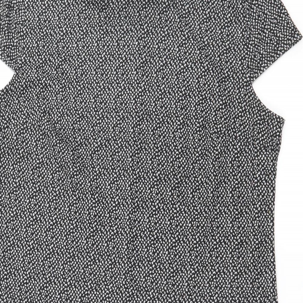 Brand and care label for Dorothy Perkins women’s black ringer blouse, size UK 14