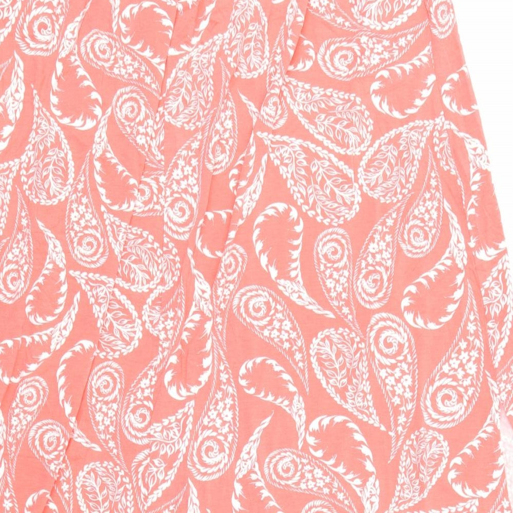 Brand and care label for Next women’s red floral a-line skirt, size UK 32, in