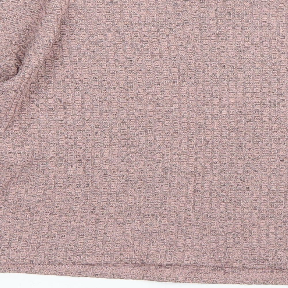 Brand and care label for New Look girls’ pink jumper, size 10-11, years