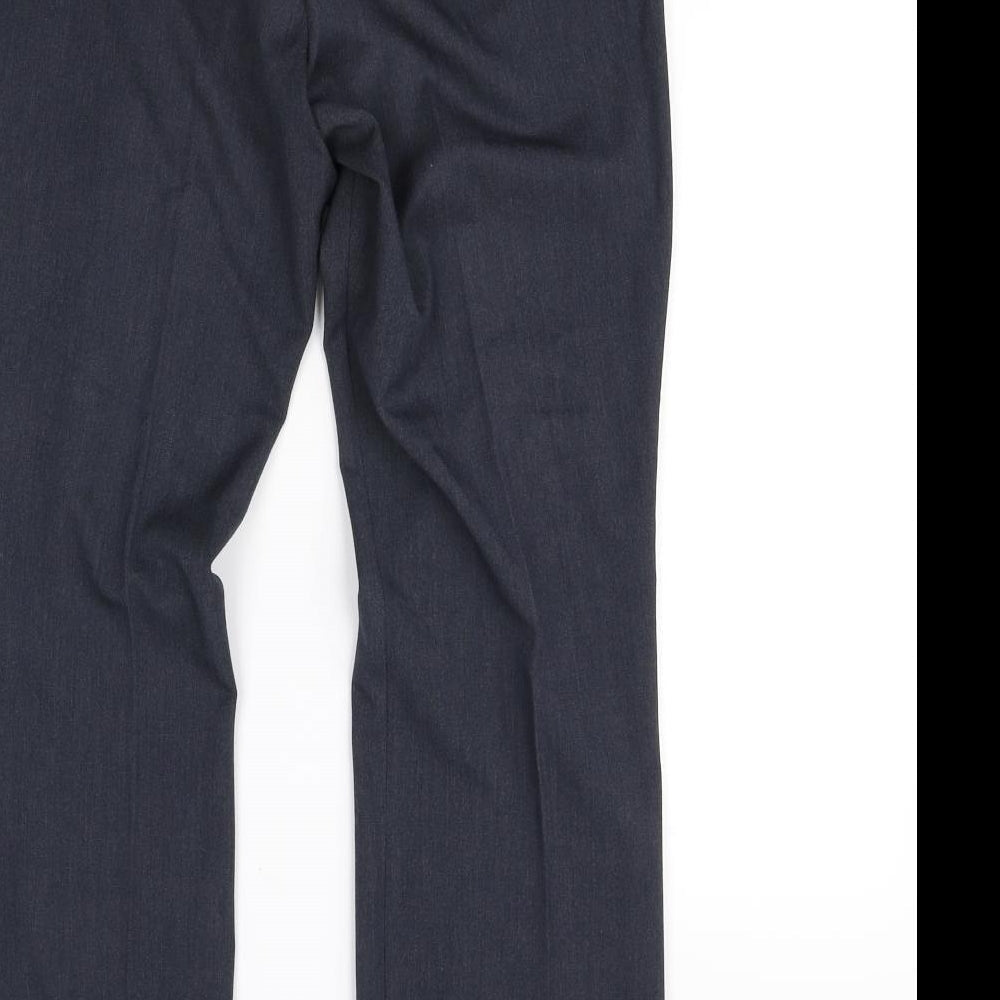 Brand and care label for Marks & Spencer women’s blue dress pants trousers, size UK 12, 29-inch leg