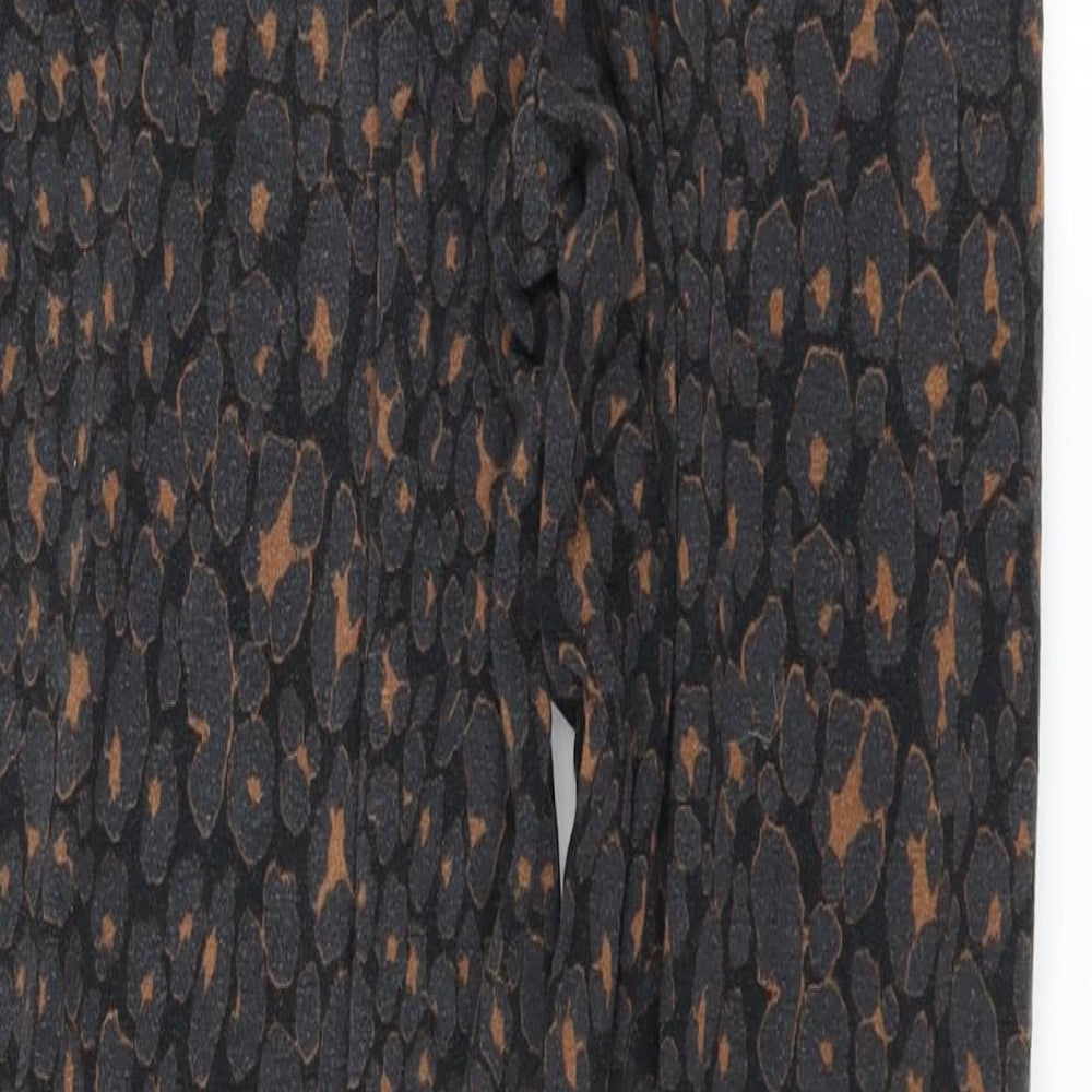 Brand and care label for Next women’s black animal print jogger leggings, size UK 6, 25-inch leg