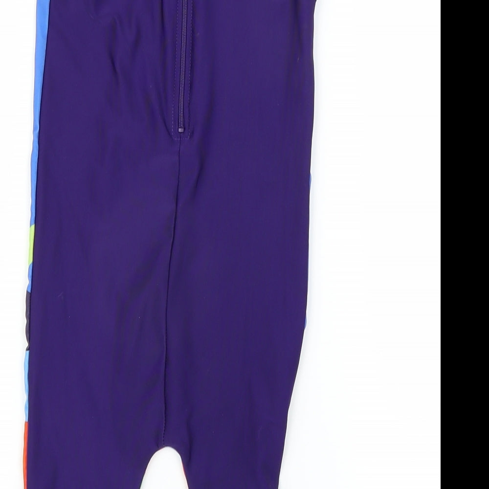 Brand and care label for B&M Baby Purple Catsuit One-Piece, size 18-24, Months