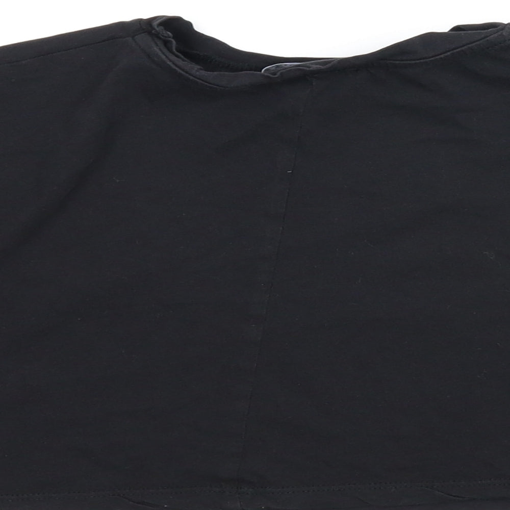 Brand and care label for New Look girls’ black cropped tank, size 10-11, years