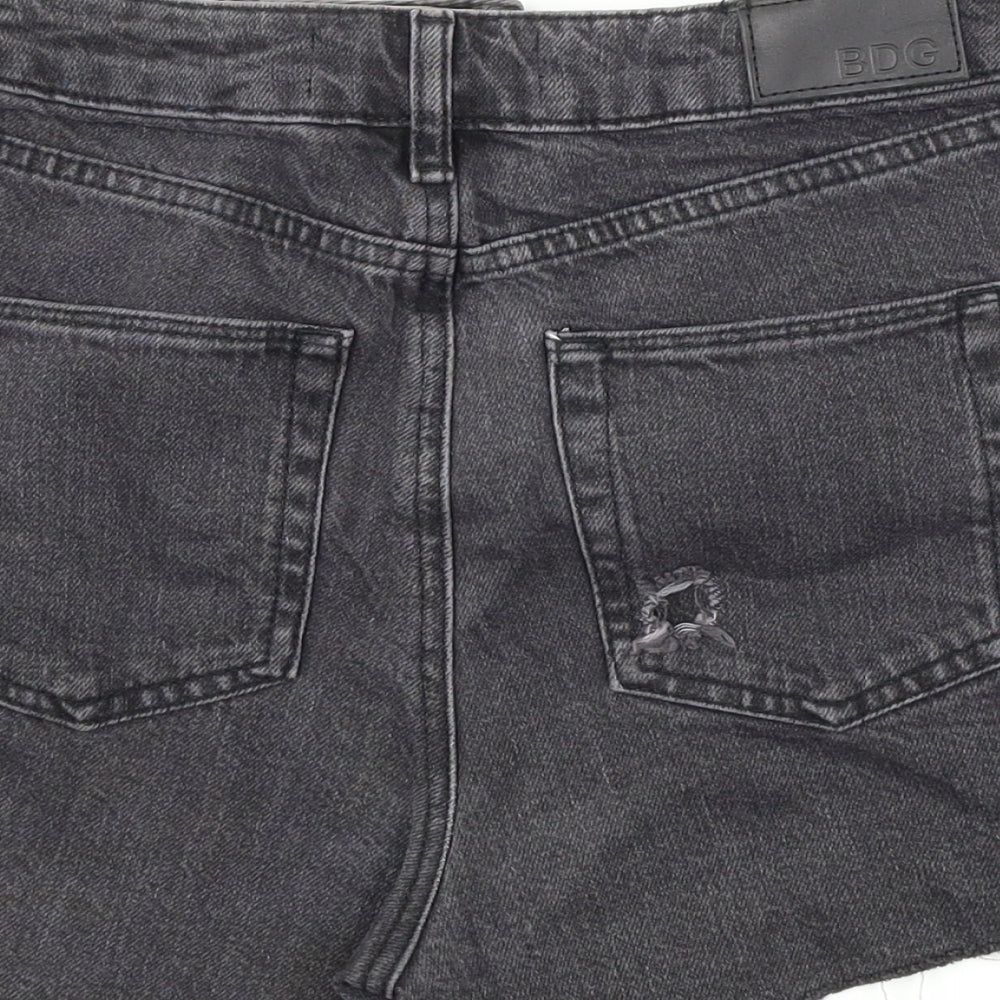 Brand and care label for BDG women’s black denim hot pants shorts, size UK 27, in