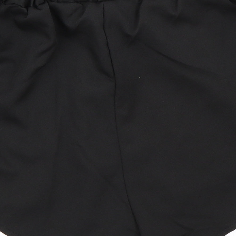 Brand and care label for Zaful women’s black hot pants shorts, size UK 8