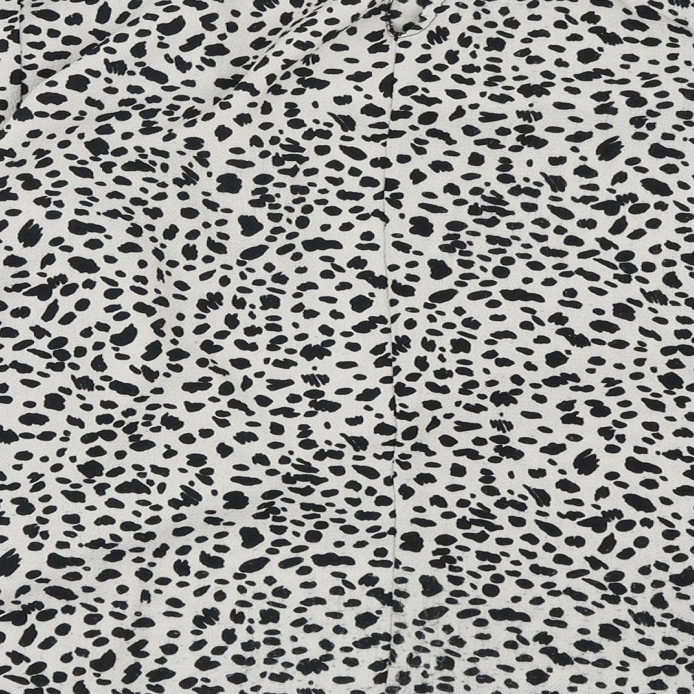 Brand and care label for Preworn women’s grey animal print basic blouse, size UK 8