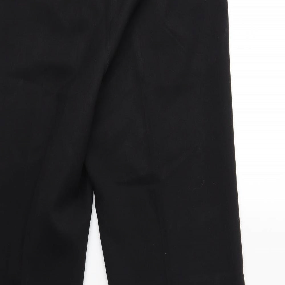 Brand and care label for Spirit women’s black trousers, size UK 34, in, 29-inch leg