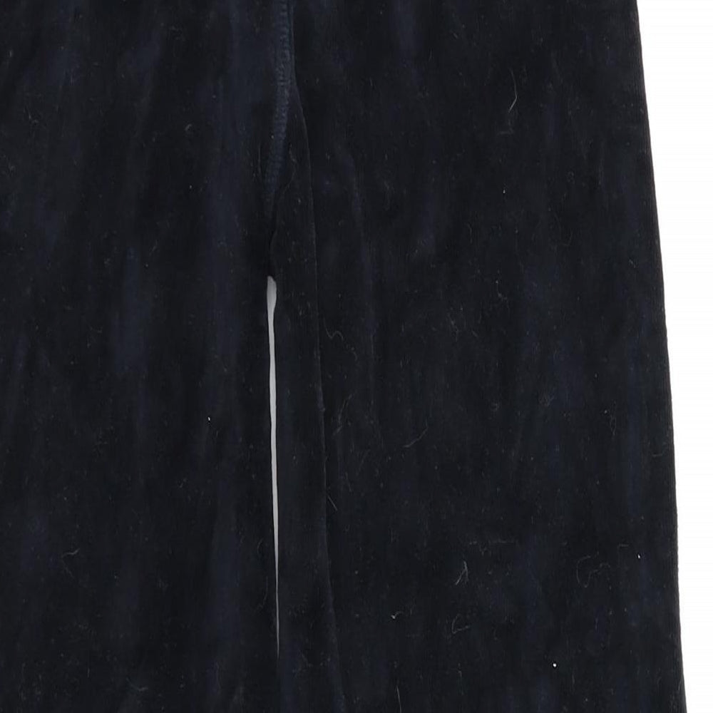 Brand and care label for Cherokee girls’ black jogger trousers, size 6-7, years