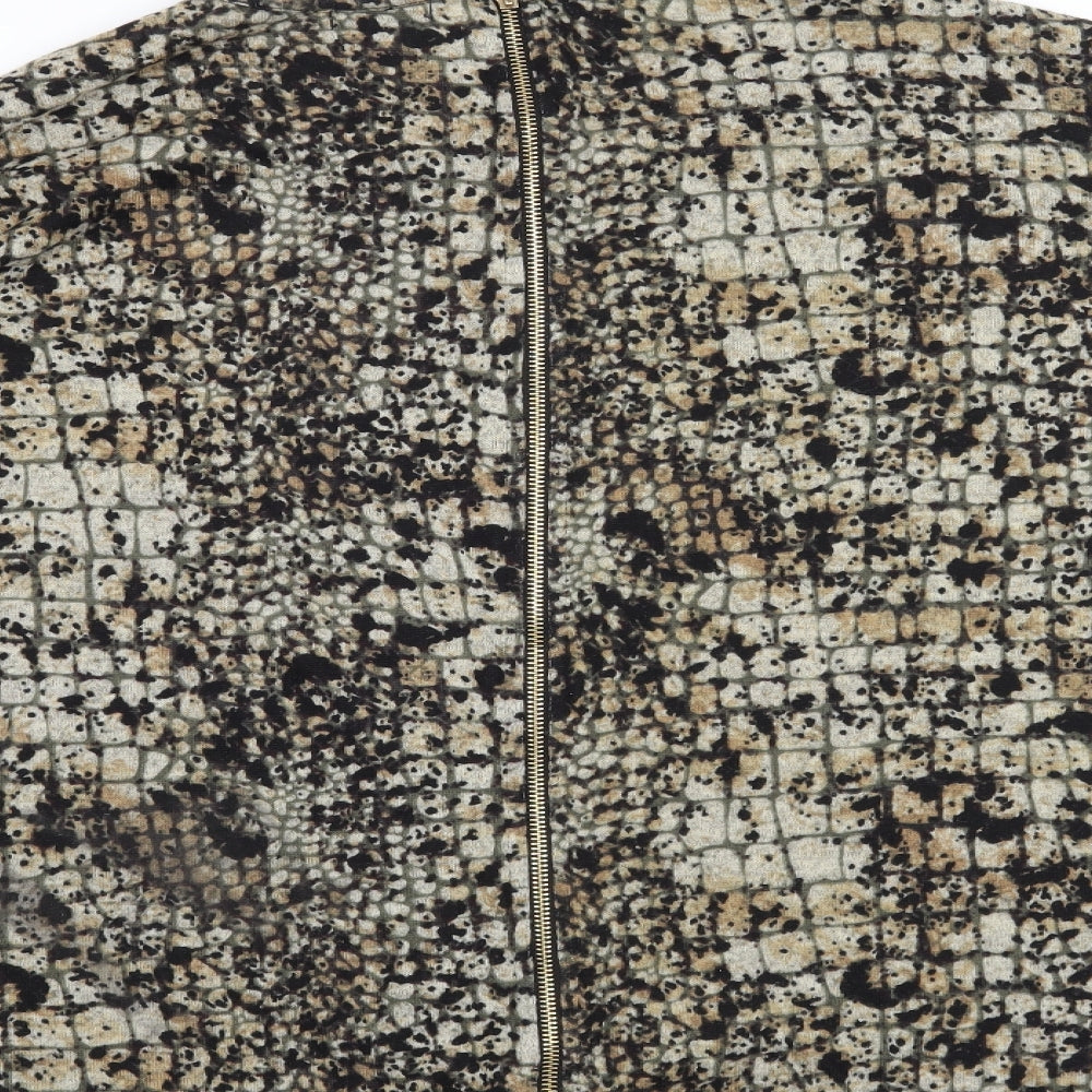 Brand and care label for Blue Vanilla women’s brown animal print pullover sweatshirt, size L