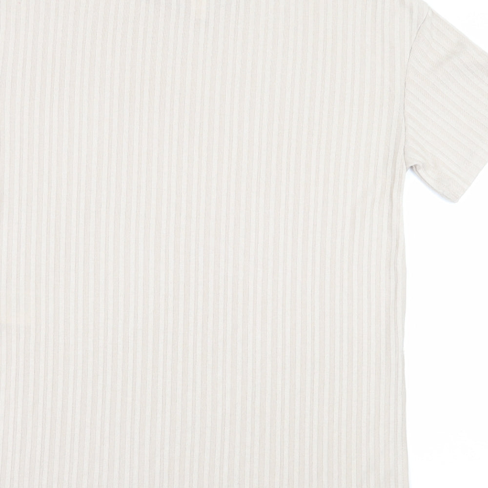 Brand and care label for H&M women’s beige basic blouse, size XS