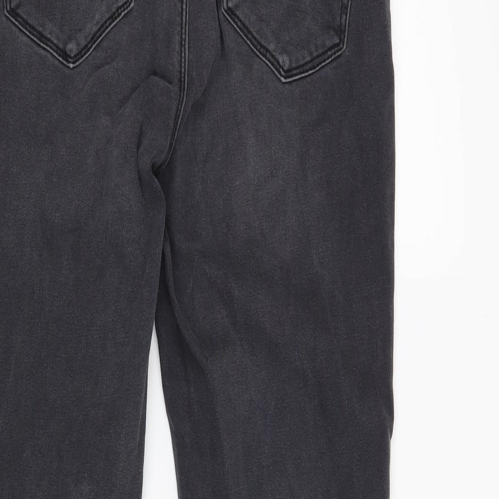 Brand and care label for ASOS men’s black skinny jeans, size 30, in, 30-inch leg