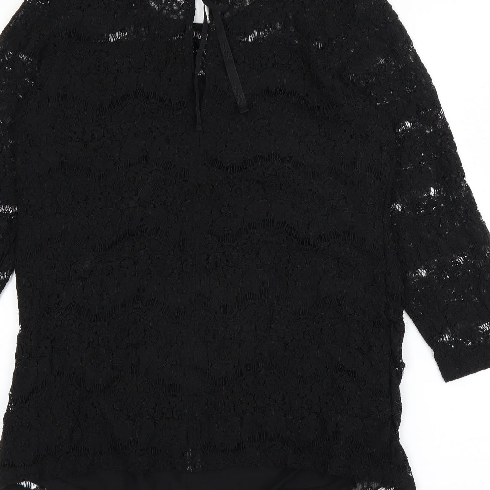 Brand and care label for H&M women’s black basic t-shirt, size M