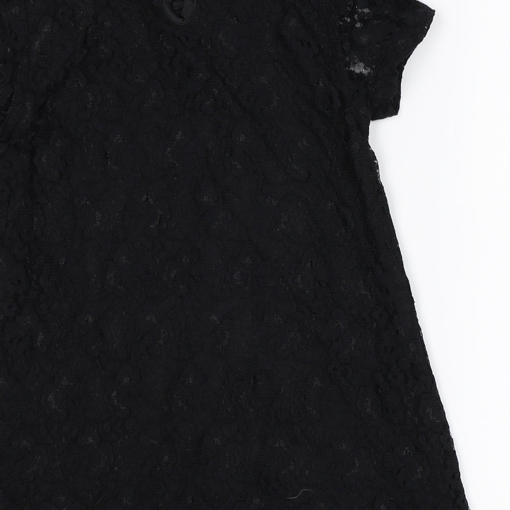 Brand and care label for Young Dimension girls’ black basic t-shirt, size 9-10, years