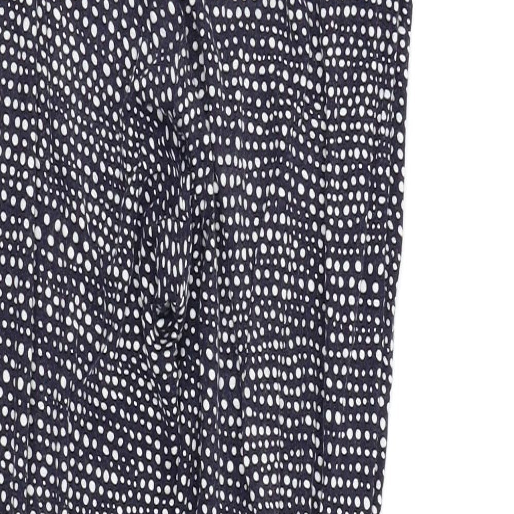 Brand and care label for H&M women’s blue polka dot cami lounge pants, size M