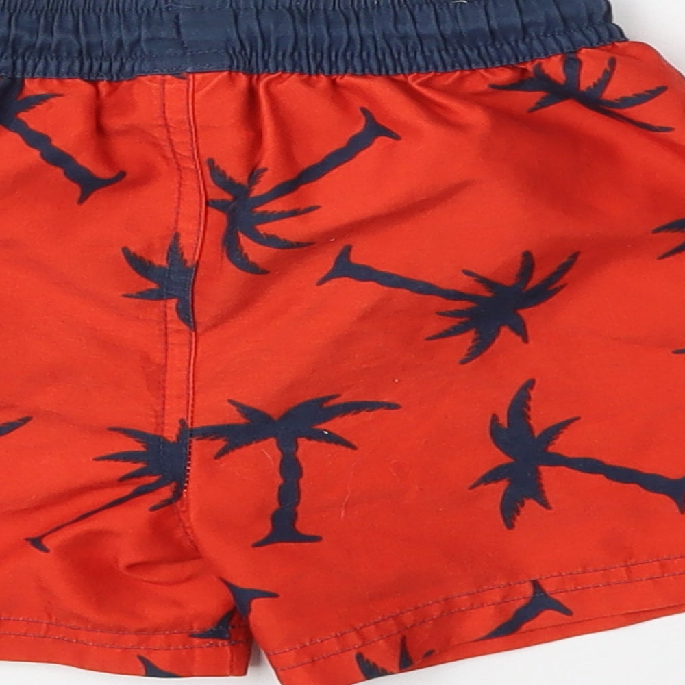 Brand and care label for Next Baby Red Floral Trousers, size 12-18, Months