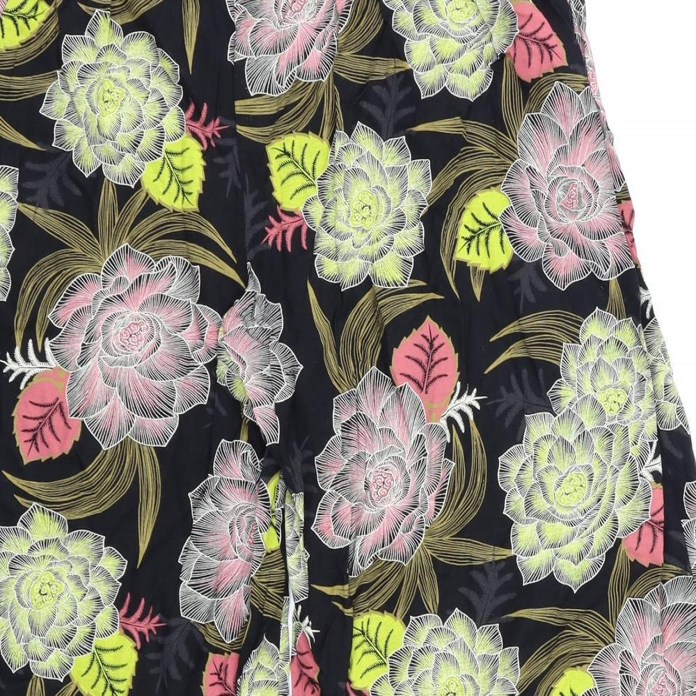 Brand and care label for Next women’s black floral trousers, size UK 10, 20-inch leg