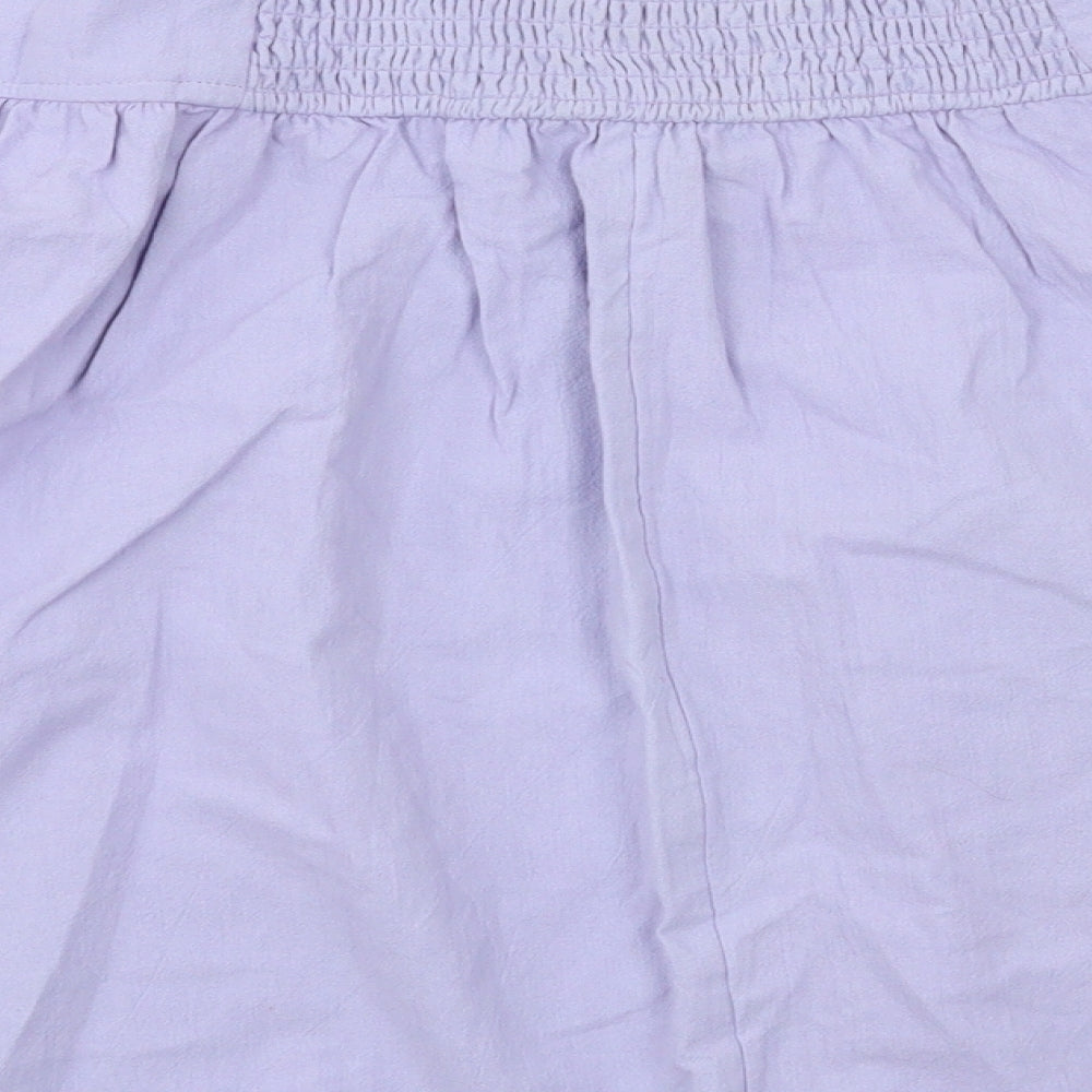 Brand and care label for Three People women’s purple houndstooth flare skirt, size L