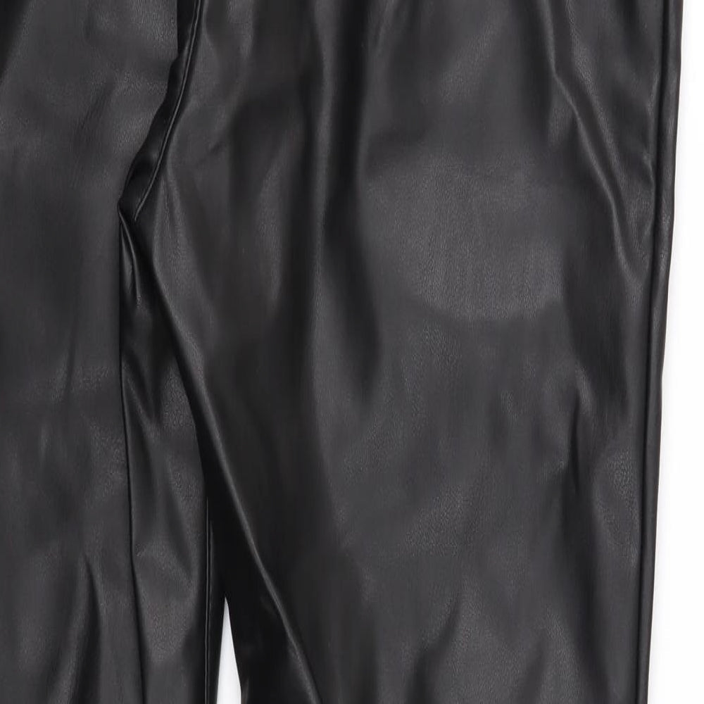 Brand and care label for Rich & Royal women’s black trousers, size UK 10, 27-inch leg