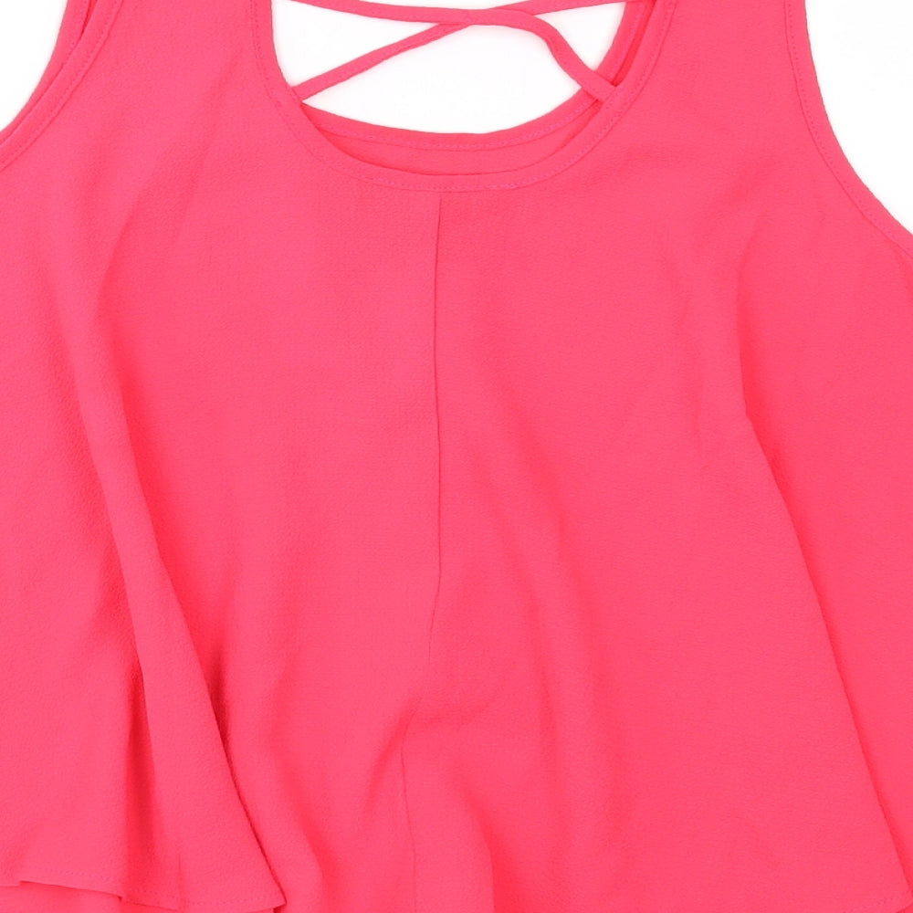 Brand and care label for Primark girls’ pink basic blouse, size 11-12, years
