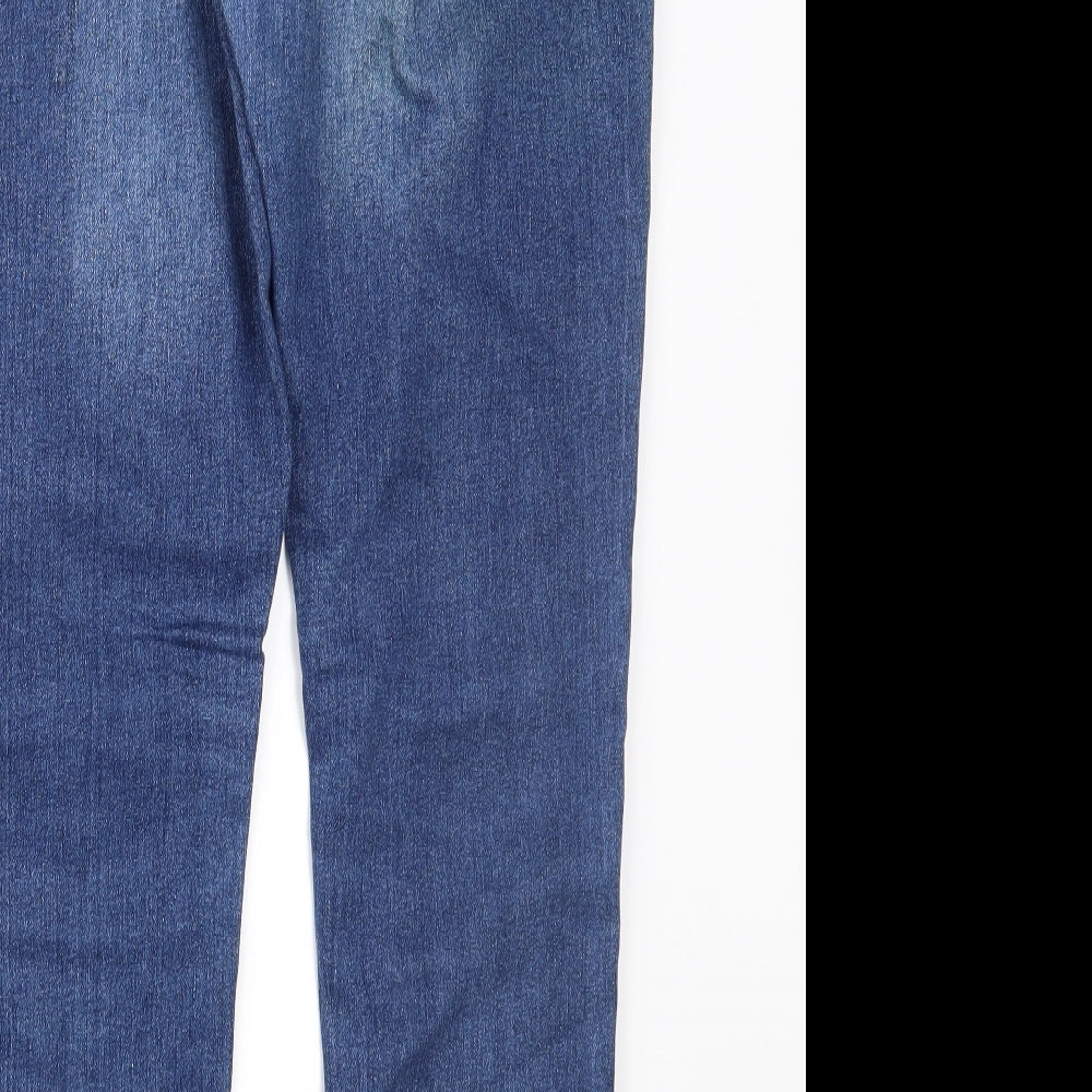 Brand and care label for Miss E-vie girls’ blue denim skinny jeans, size 10, years