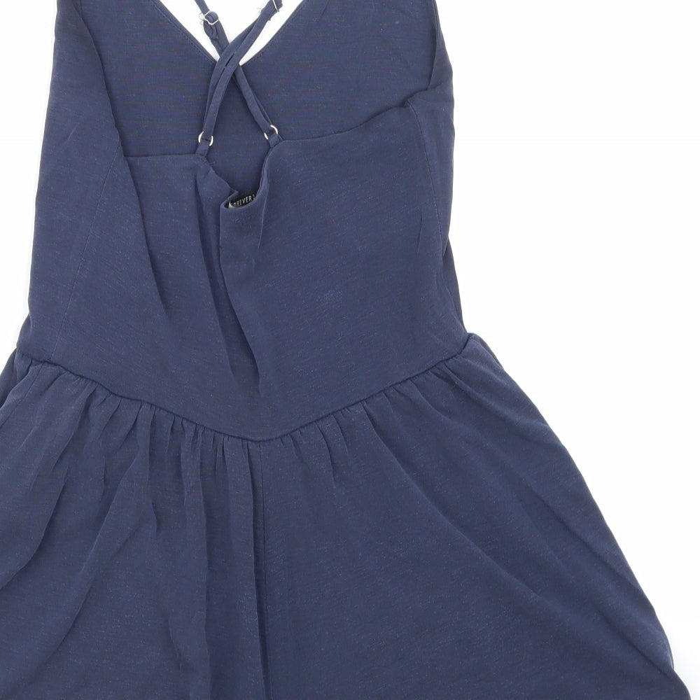 Brand and care label for Forever 21 women’s blue playsuit one-piece, size S