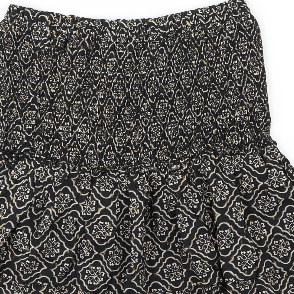 Brand and care label for Zara women’s black geometric woven basic blouse, size XS