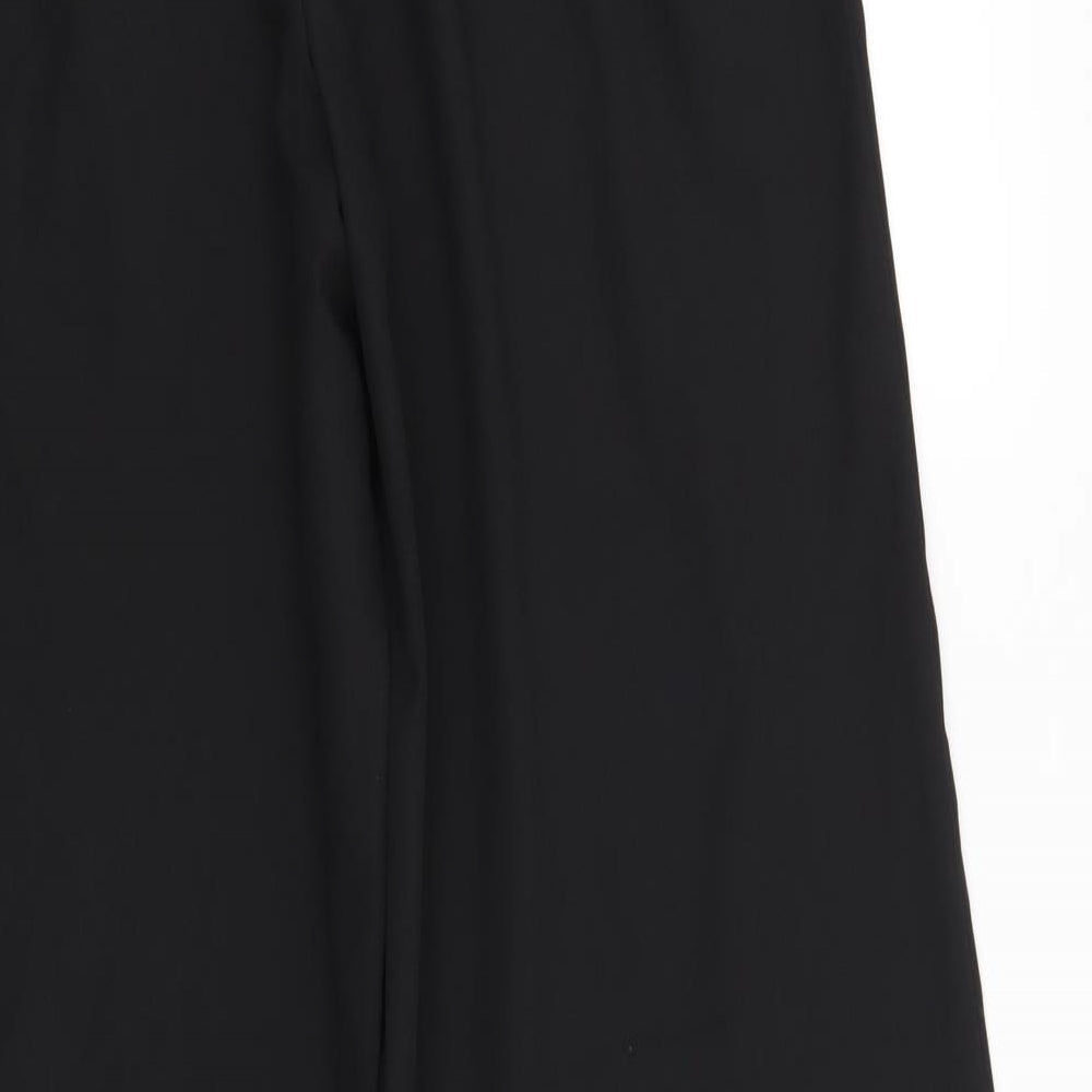 Brand and care label for Nightingales women’s black trousers, size UK 14, 29-inch leg