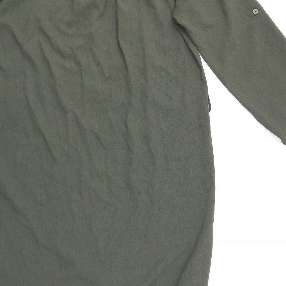 Brand and care label for Dorothy Perkins women’s green basic blouse, size UK 10