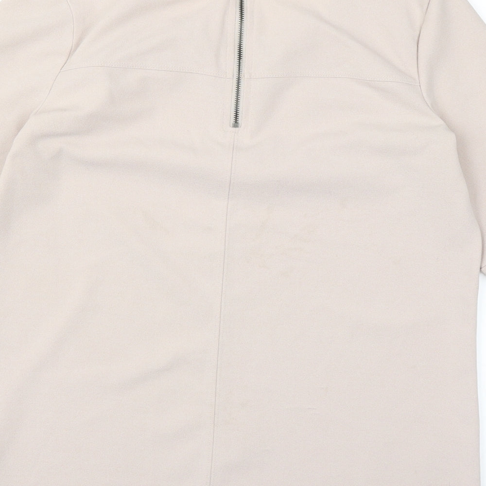 Brand and care label for Next women’s pink jumper, size UK 8