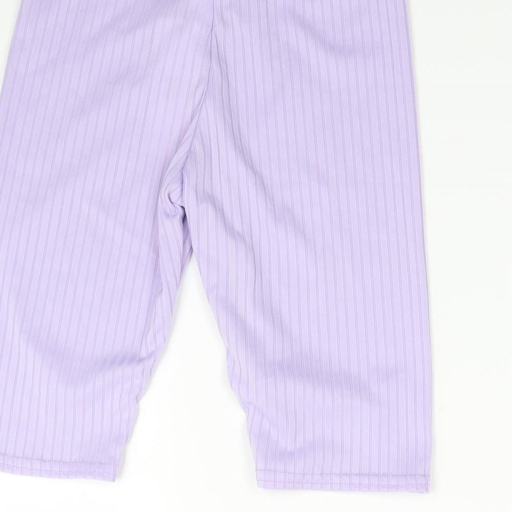 Brand and care label for I SAW IT FIRST women’s purple biker shorts, size UK 6