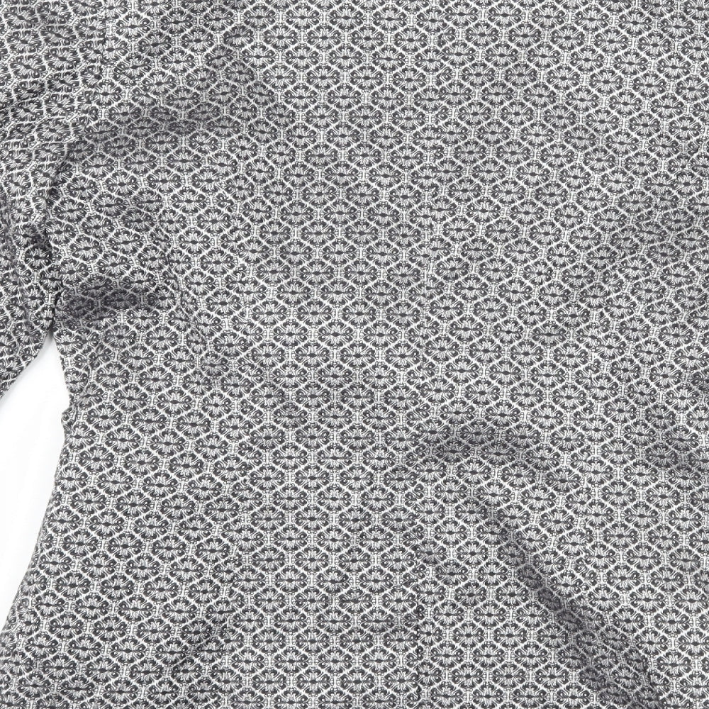Brand and care label for Dorothy Perkins women’s silver geometric jacket suit jacket, size UK 8