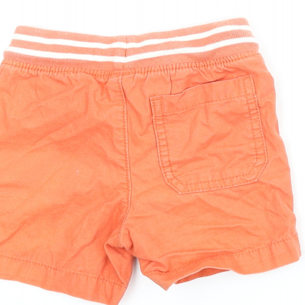 Brand and care label for Gap boys’ orange cropped trousers, size 12-18, months - shorts