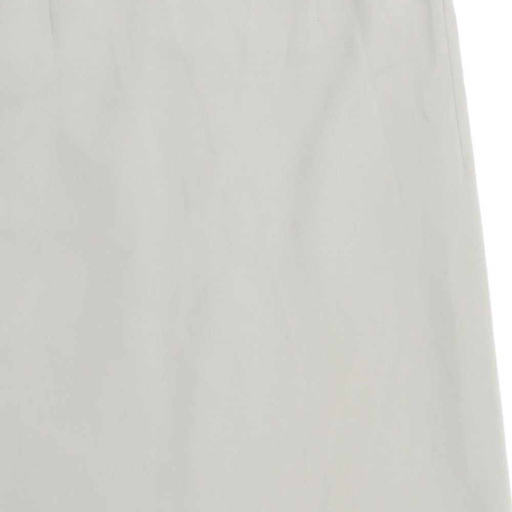 Brand and care label for NAFNAE women’s beige a-line skirt, size UK 40