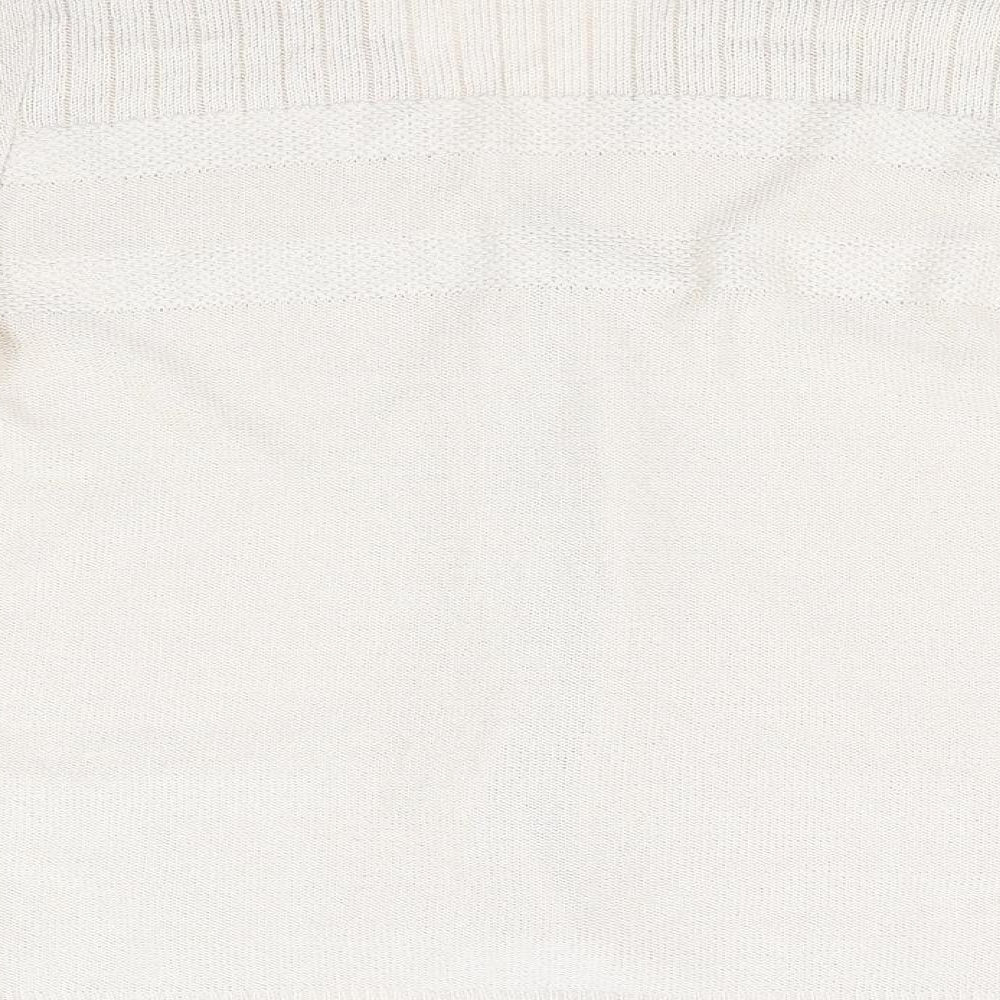 Brand and care label for Keeno women’s beige jumper, size M