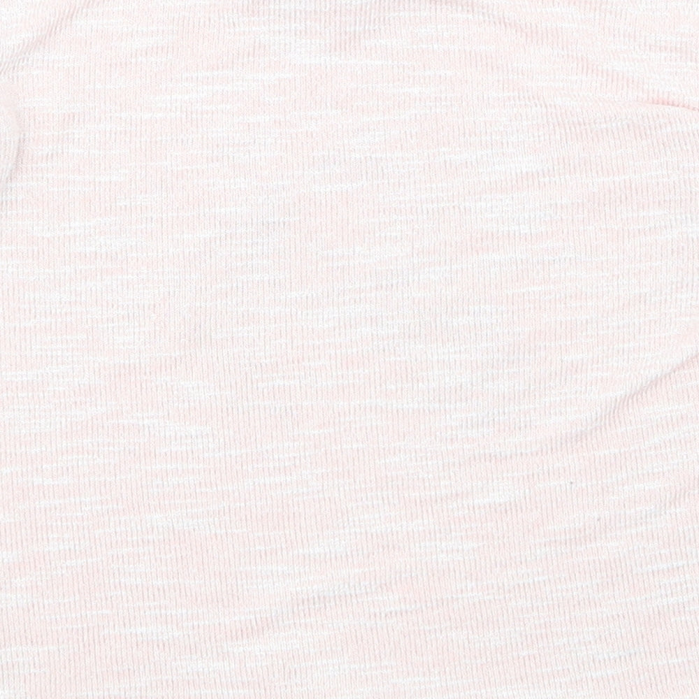 Brand and care label for Primark girls’ pink basic t-shirt, size 6-7, years