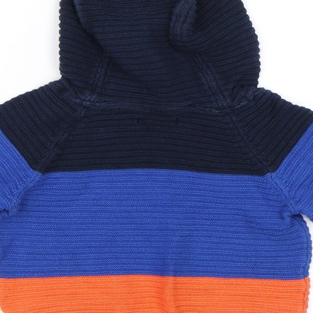 Brand and care label for Next boys’ blue colourblock jumper, size 3-6, months