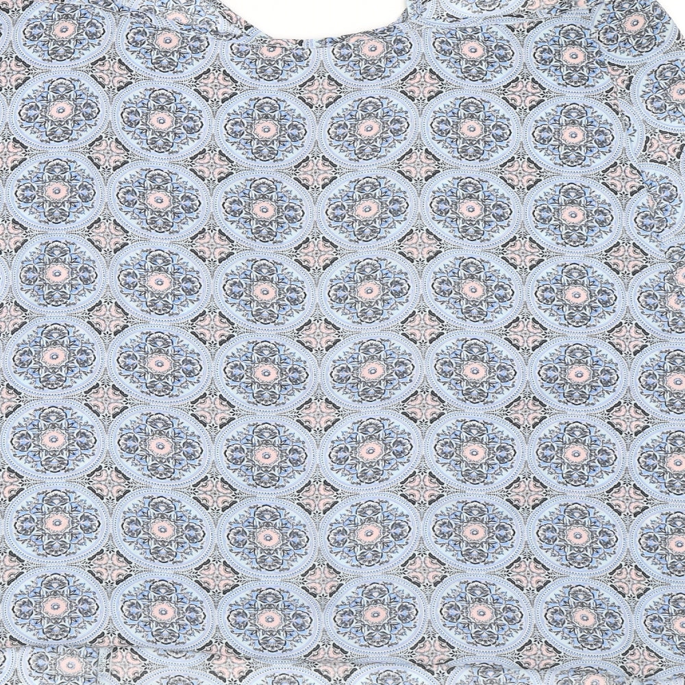Brand and care label for Dorothy Perkins women’s blue geometric basic blouse, size UK 14