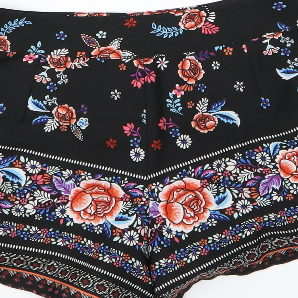 Brand and care label for New Look girls’ black floral chiffon sailor shorts, size 10, years