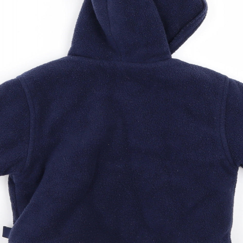 Brand and care label for Baby Mac boys’ blue jacket, size 3-6, months