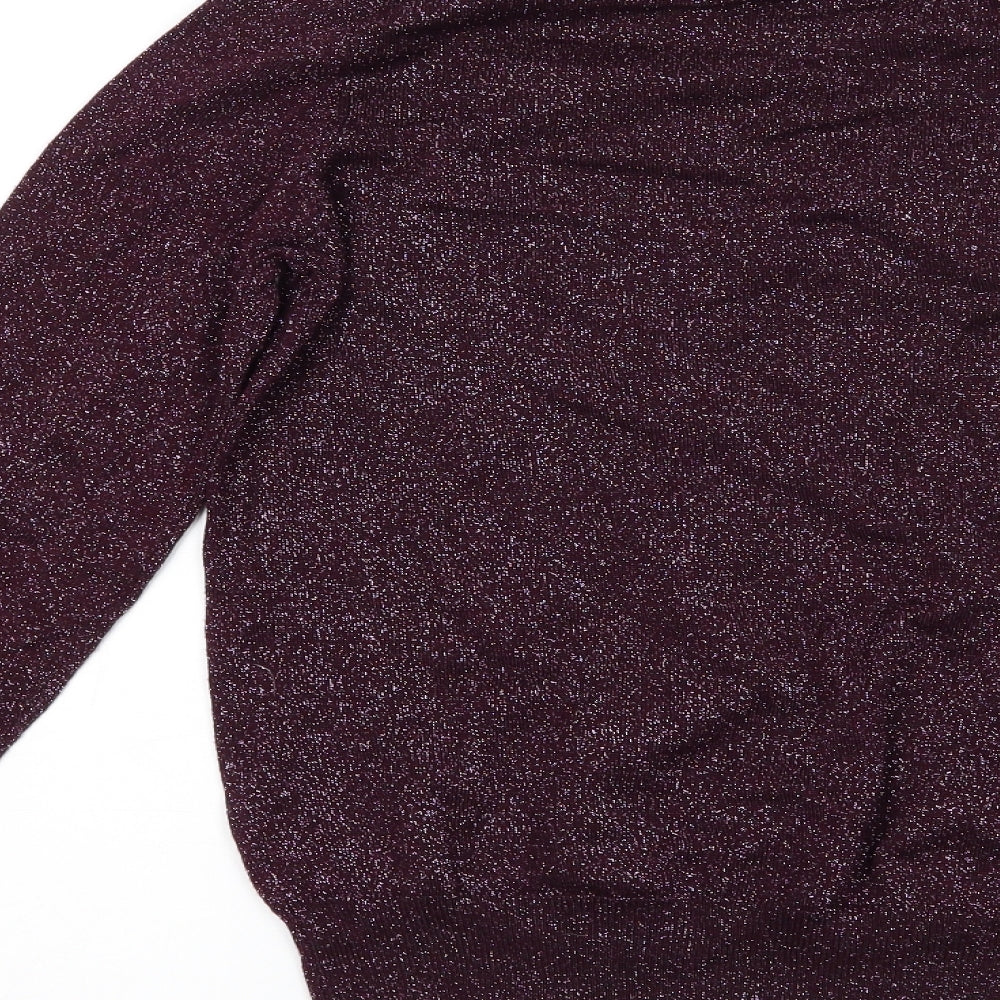 Brand and care label for Dunnes women’s purple jumper, size M