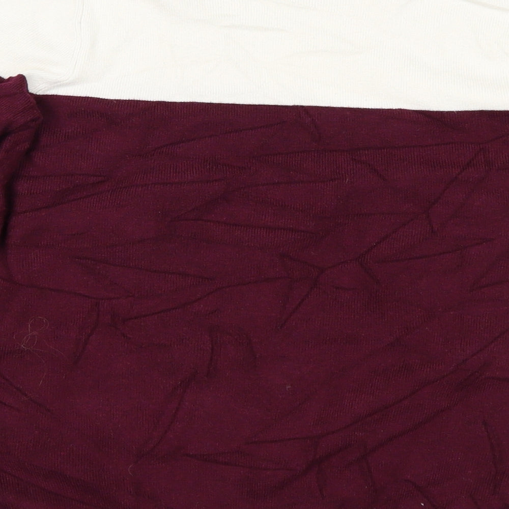 Brand and care label for Marks & Spencer women’s purple knit jumper, size UK 12