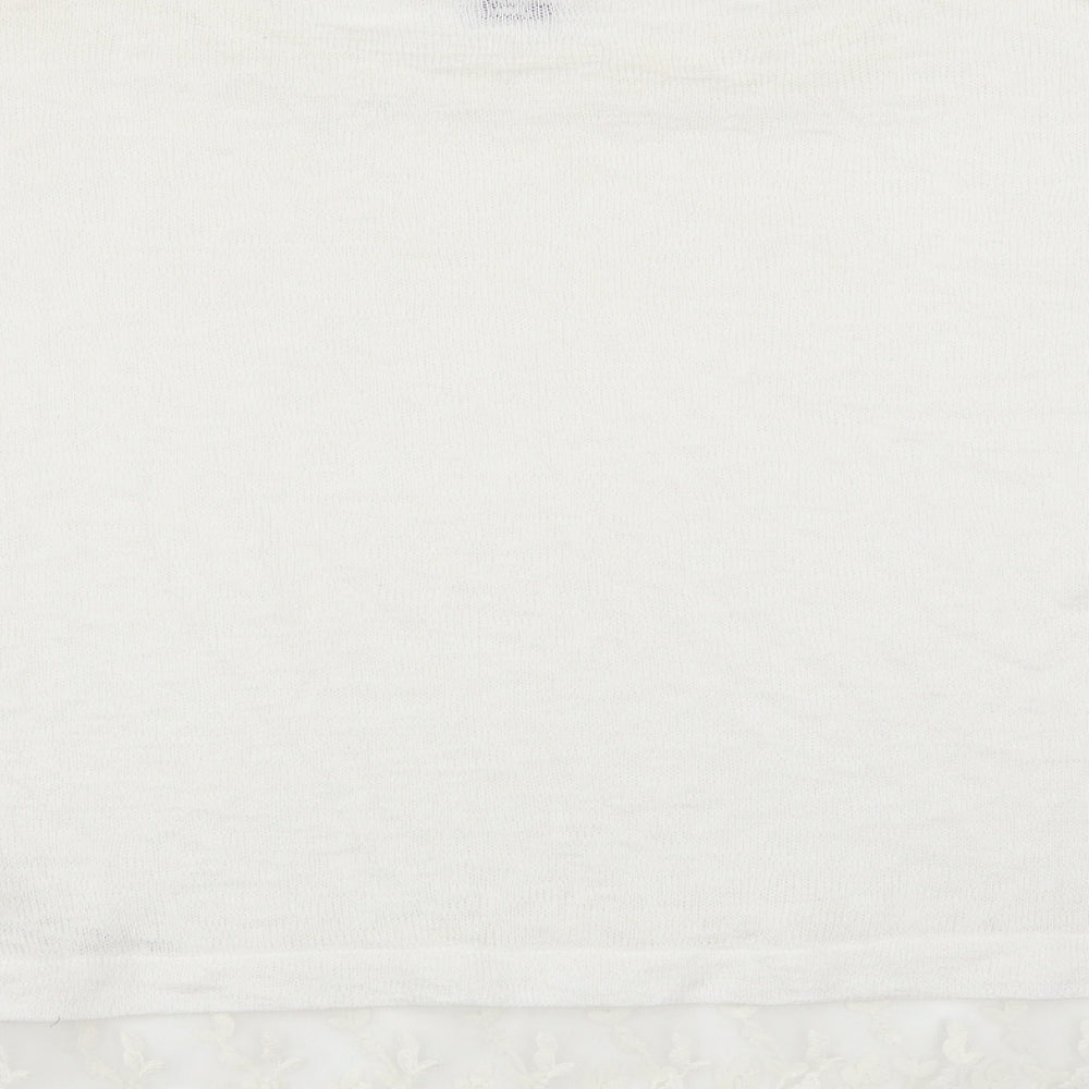 Brand and care label for Tobi women’s white jumper, size S