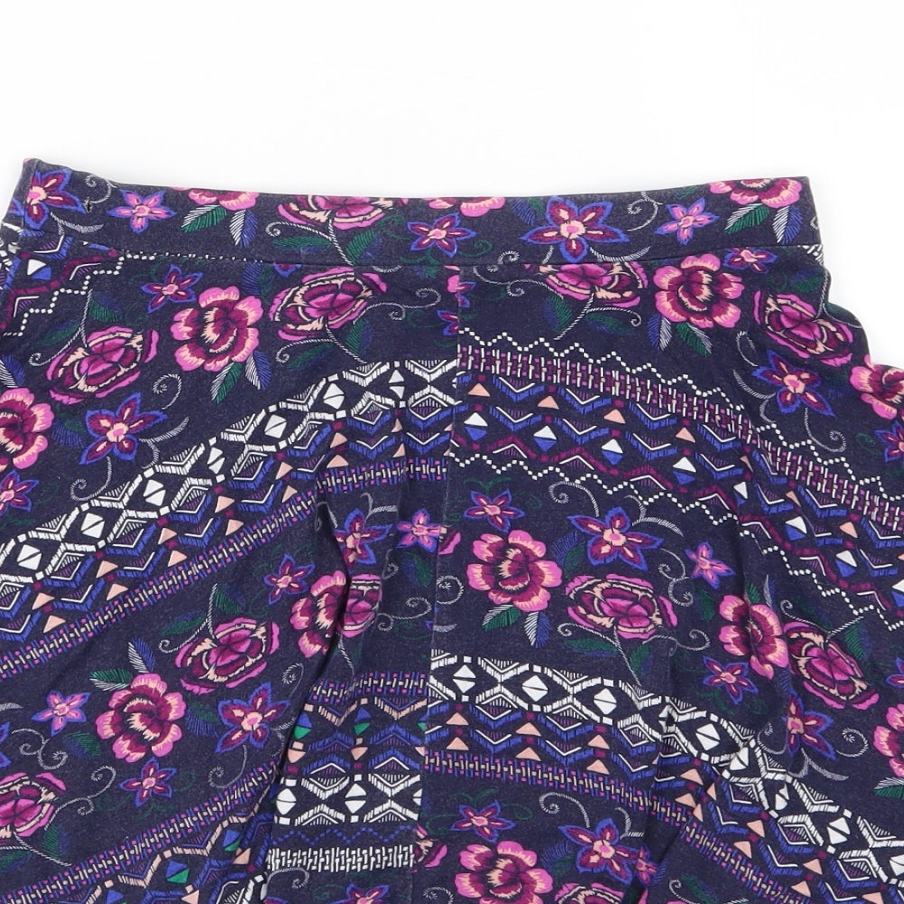 Brand and care label for Young Dimension girls’ purple floral jersey a-line skirt, size 10-11, years
