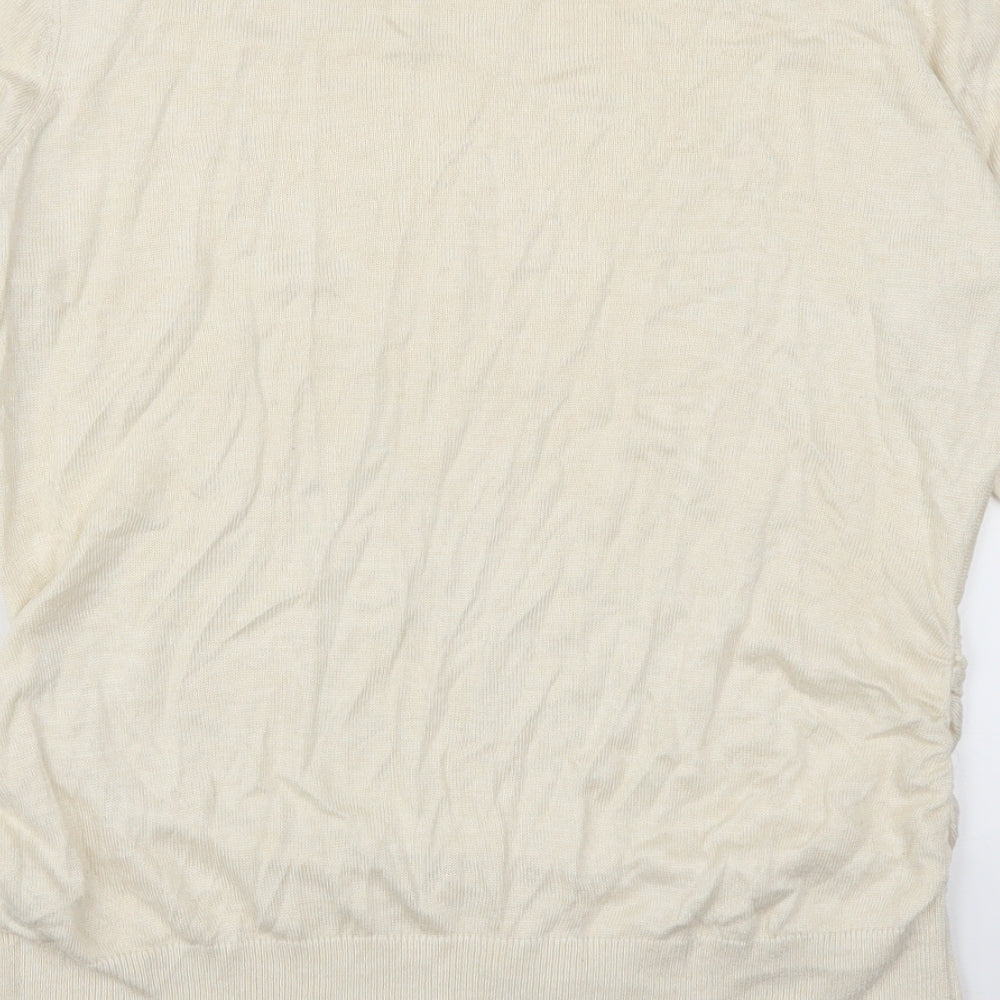 Brand and care label for Reitmans women’s beige rayon jumper, size L