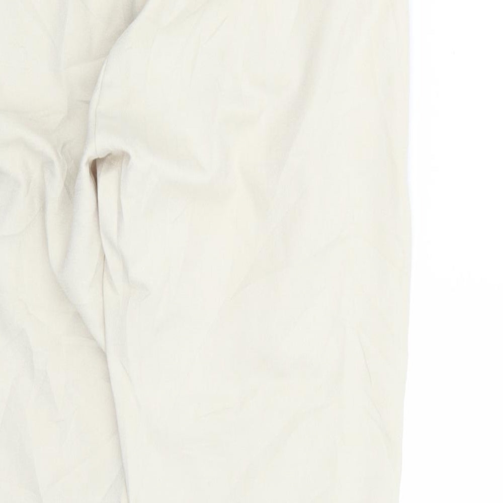 Brand and care label for Mama Licous women’s beige trousers, size S, 27-inch leg