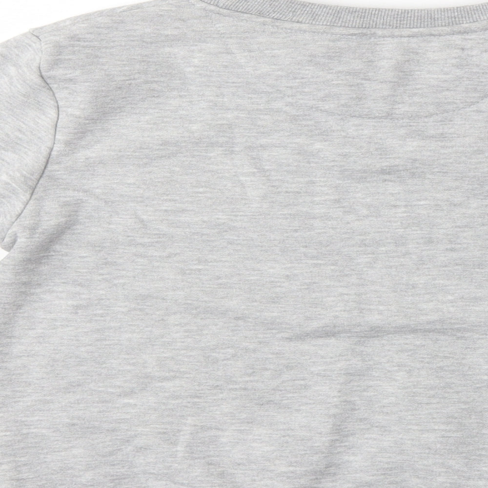 Brand and care label for Primark girls’ grey jumper, size 9-10, years