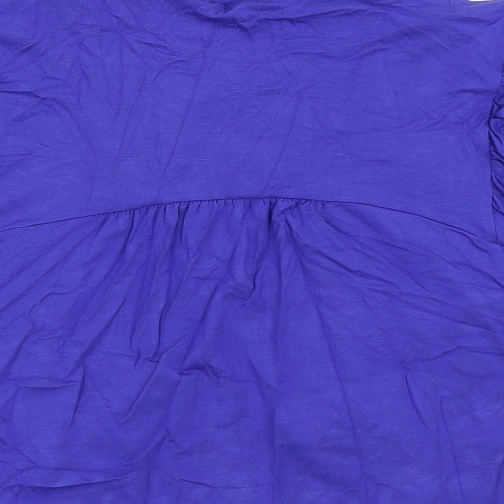Brand and care label for Marks & Spencer women’s blue cardigan jumper, size UK 12