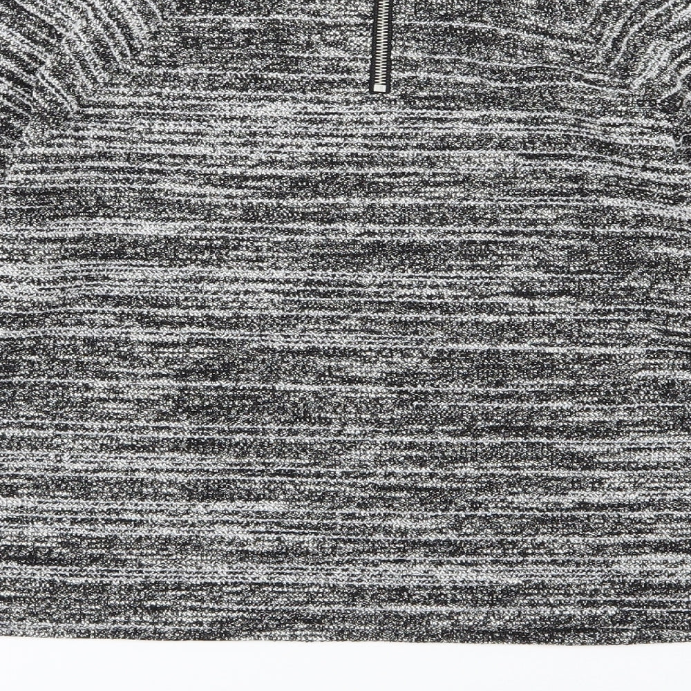 Brand and care label for Marks & Spencer women’s black striped knit jumper, size UK 14