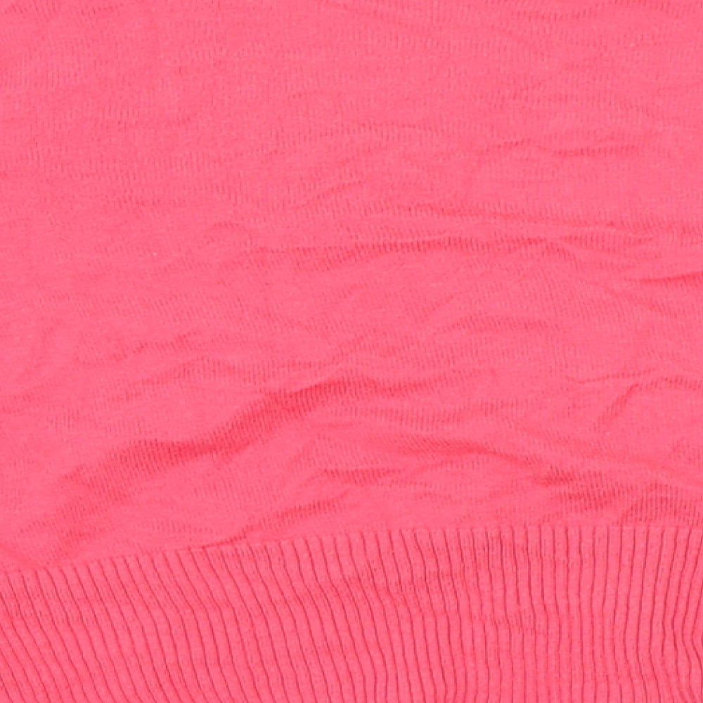 Brand and care label for Marks & Spencer women’s pink jumper, size UK 18